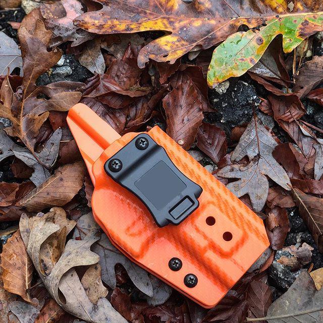 Drilled for all clips (Quick Clip shown - CF Orange)